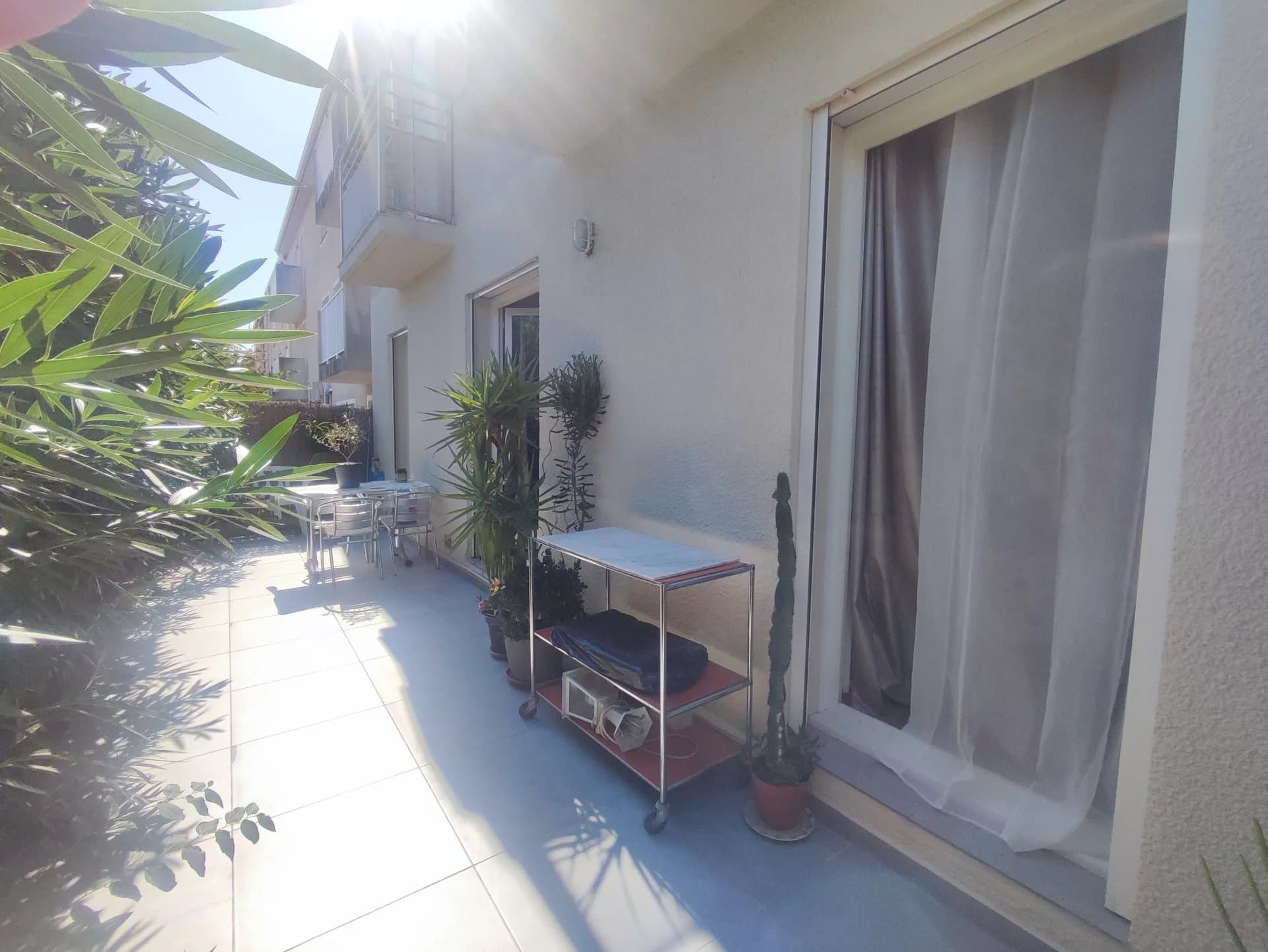 Appartement rez de chaussée avec garage et terrasse jardin